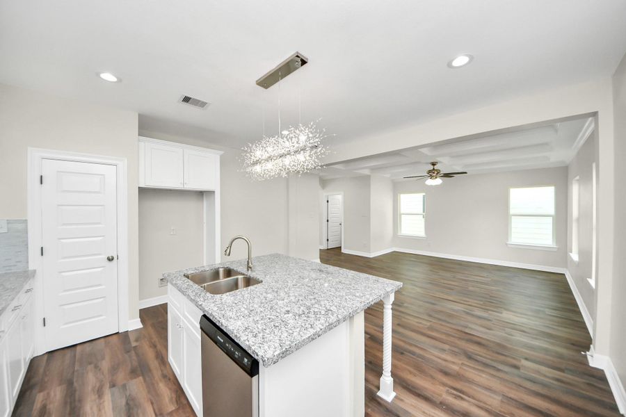 This thoughtfully designed kitchen opens seamlessly into the family room, creating a connected and functional space that’s perfect for entertaining. Whether you're cooking dinner or hosting guests, the open layout allows you to stay engaged with family and friends - (representation photo).