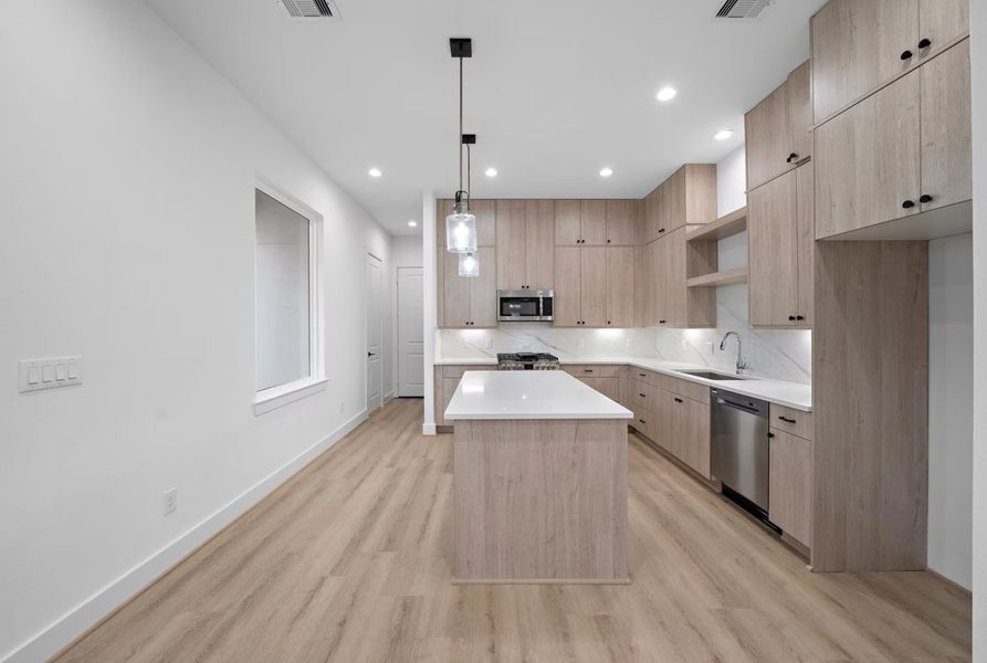 Representative furnished interior of a home built from the The Gianna by Riverway Homes in The Heights Haus Collection, Houston (Image 8).