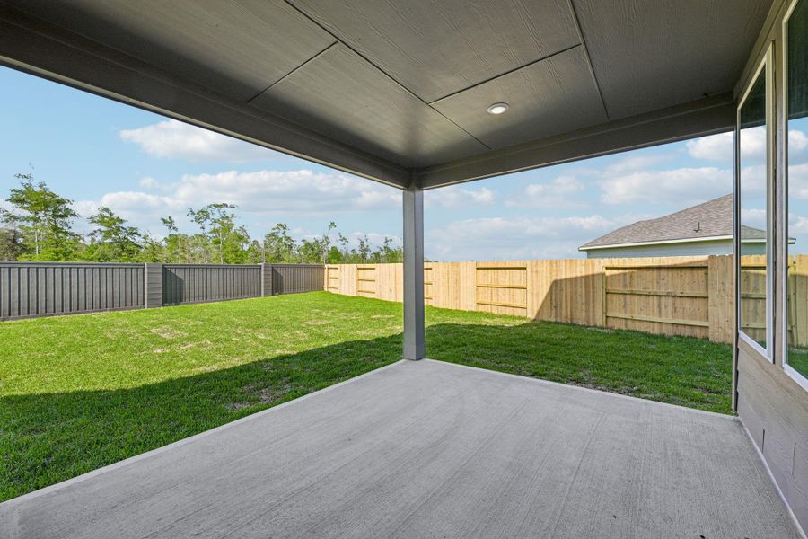 Exterior details and patio area of a home in Riviera Pines - Classic Series, Huffman (Image 29).