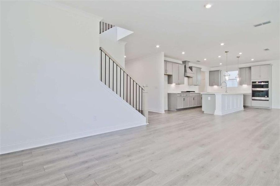 Spacious, unfurnished interior of a new home in The Paddocks at Doc Hughes, Buford (Image 19).