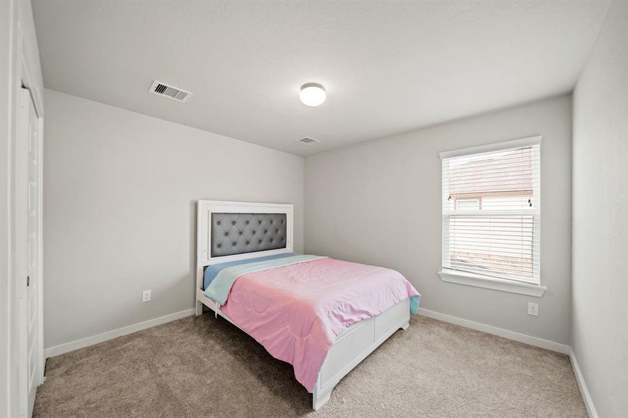 Your second bedroom offers a generous and inviting space that exudes comfort and versatility.