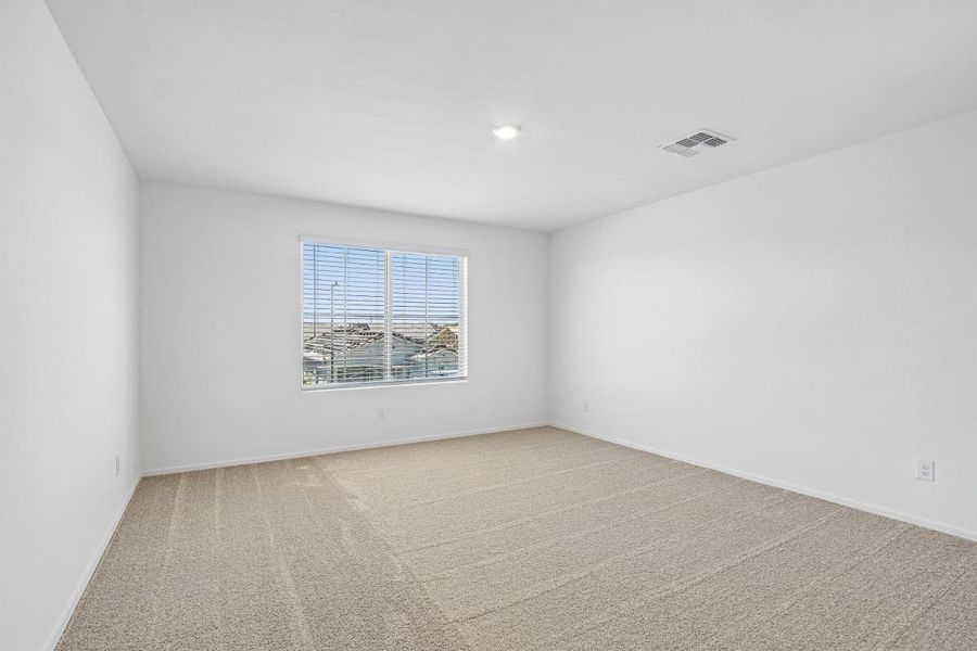 Spacious, unfurnished interior of a new home in Bella Camino Traditions, San Tan Valley (Image 13).