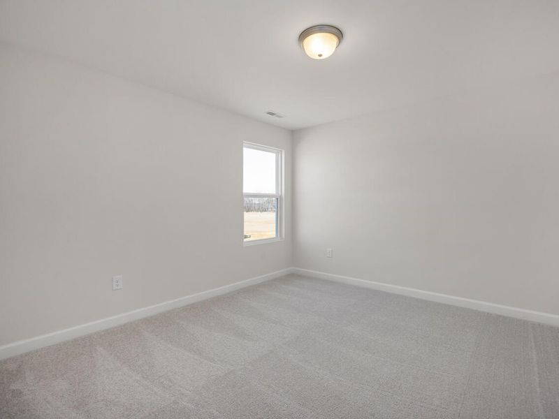 Spacious, unfurnished interior of a new home in Retreat at North Main, Lillington (Image 23).