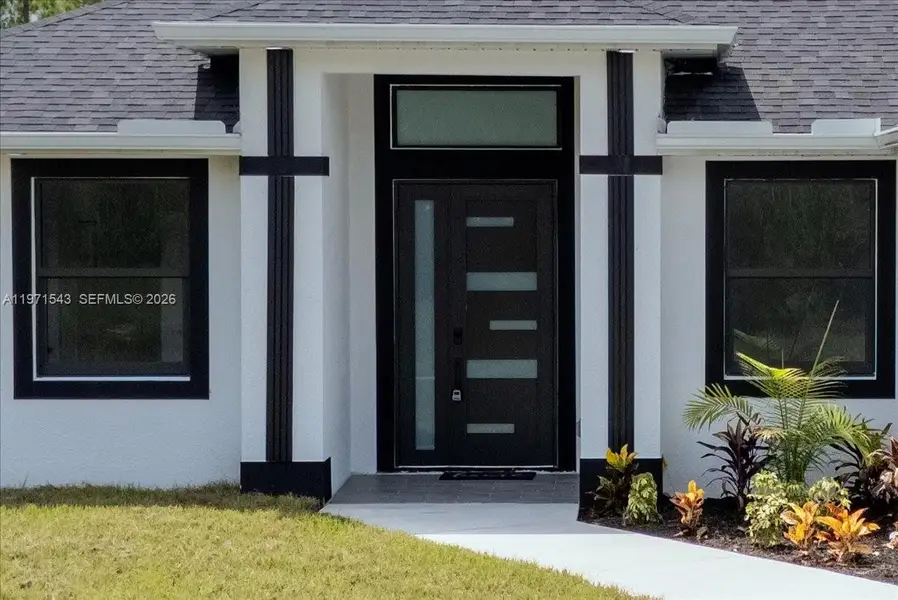 Exterior details and patio area of a home in , Lehigh Acres (Image 3).