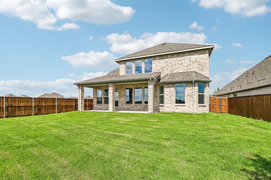 Exterior details and patio area of a home in Lilyana, Celina (Image 4).