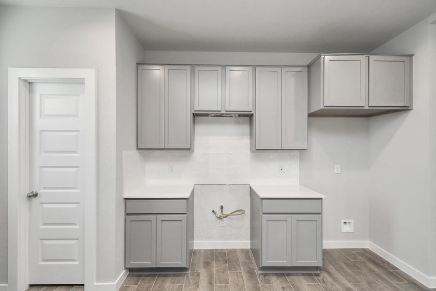 Sample photo of completed home with similar floor plan. Actual colors and selections may vary.