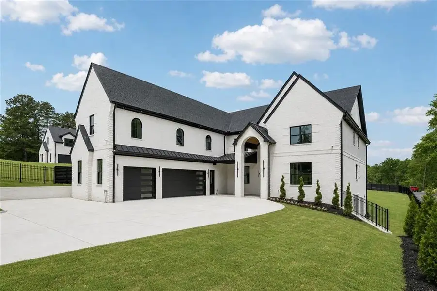 Front exterior of a new home in , Buford, GA, highlighting curb appeal (Image 33).