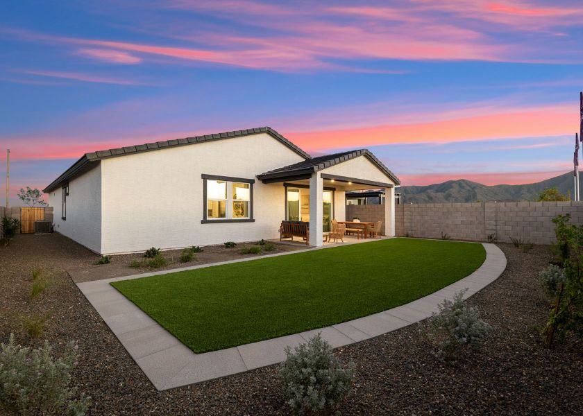 A house with a large front yard. A house with a large front yard.