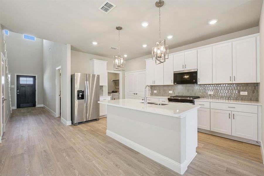 Photo is not of the actual home, but is an inspirational photo of builder’s model home and may depict options, furnishings, and/or decorator features that are not included. Photo is not of the actual home, but is an inspirational photo of builder’s model home and may depict options, furnishings, and/or decorator features that are not included.