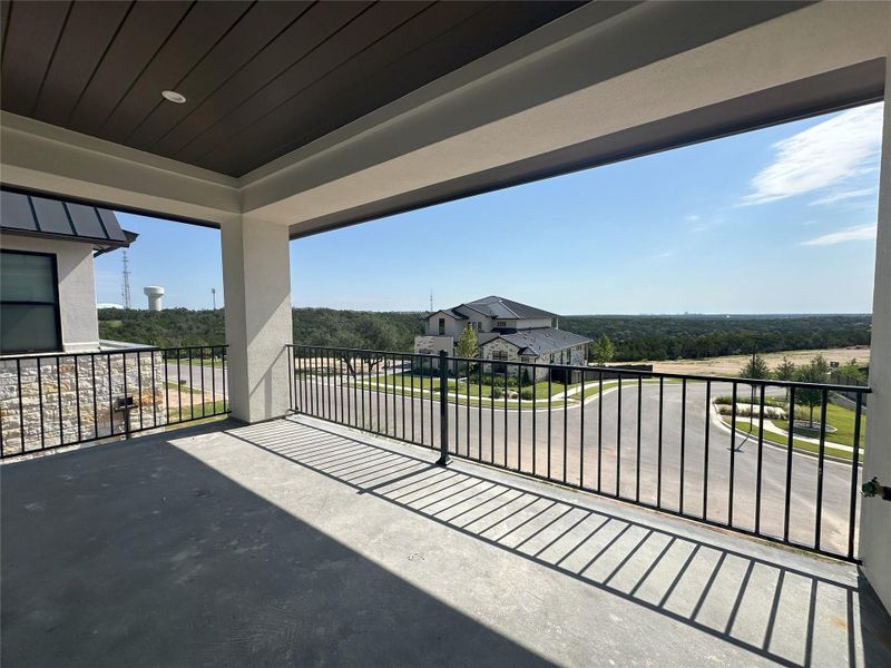 Exterior details and patio area of a home in Milky Way at River Place, Austin (Image 3).