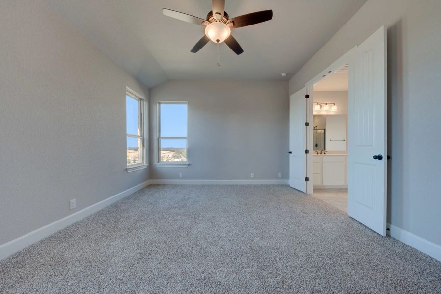 Representative unfurnished interior of a home built from the Barnett by Ashton Woods in Sunday Creek at Kinder Ranch, San Antonio (Image 24).