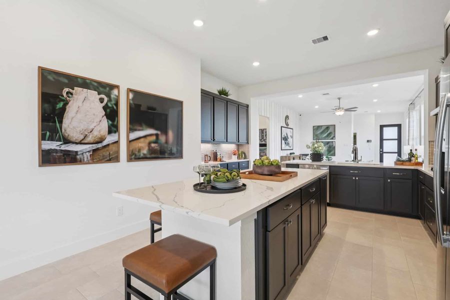 Furnished interior view inside a new home in Sunterra, Katy (Image 17).