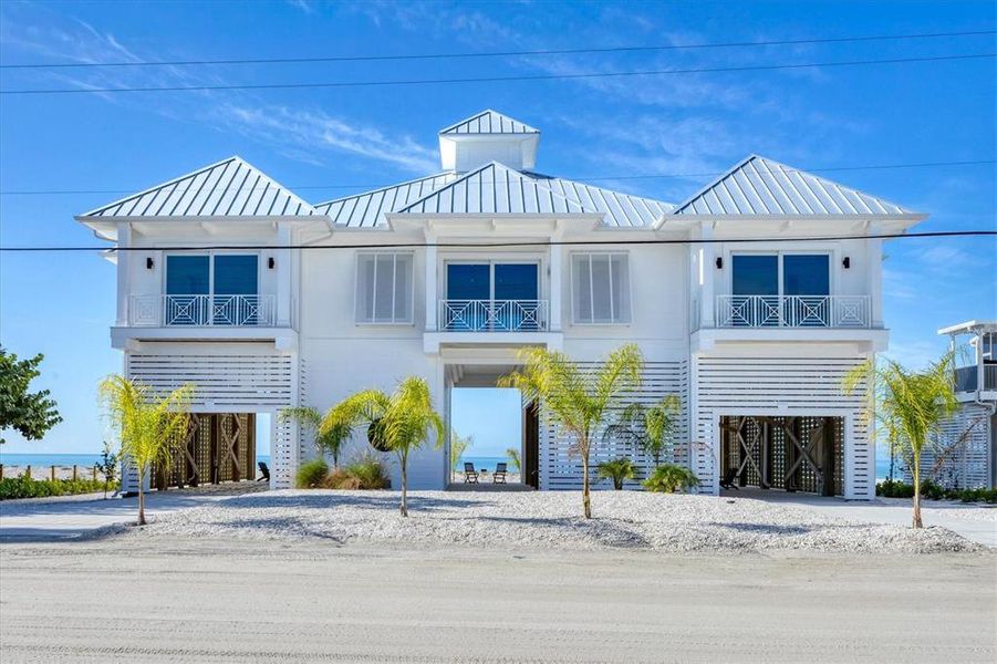 Front exterior of a new home in , Placida, FL, highlighting curb appeal (Image 23).