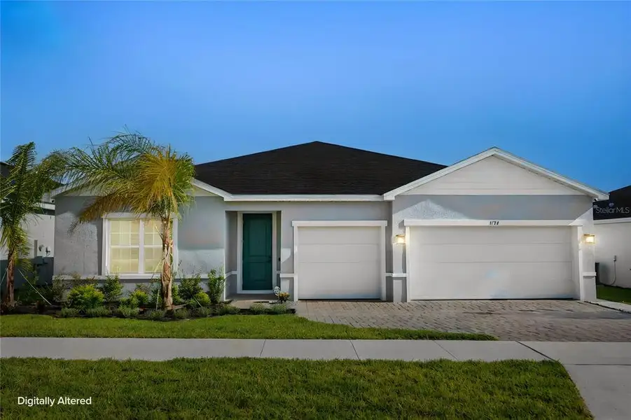 Front exterior of a new home in , Winter Haven, FL, highlighting curb appeal (Image 2). Front exterior of a new home in , Winter Haven, FL, highlighting curb appeal (Image 2).