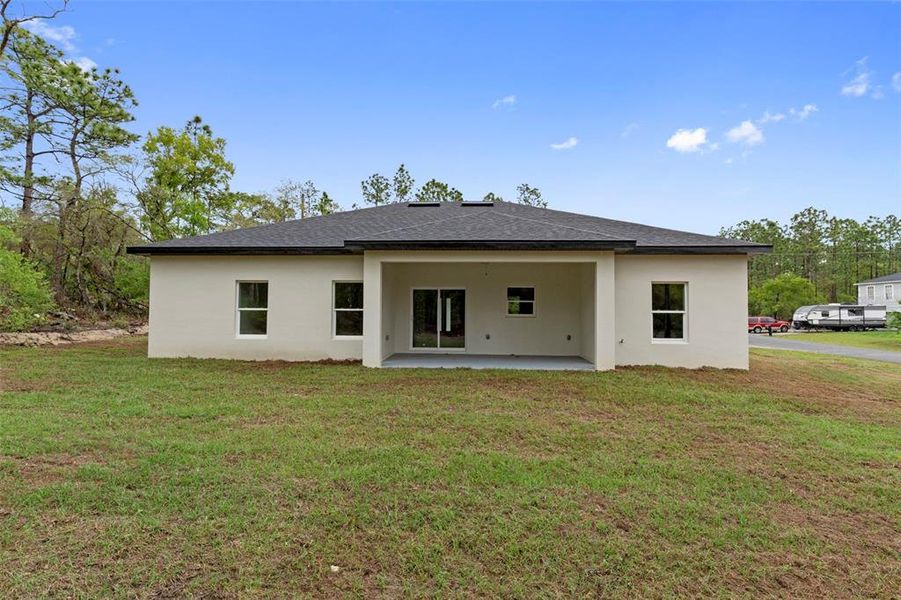 Exterior details and patio area of a home in , Citrus Springs (Image 21).