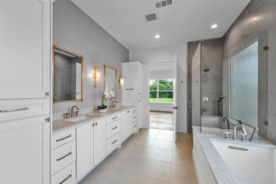 Primary bath with plenty of storage.