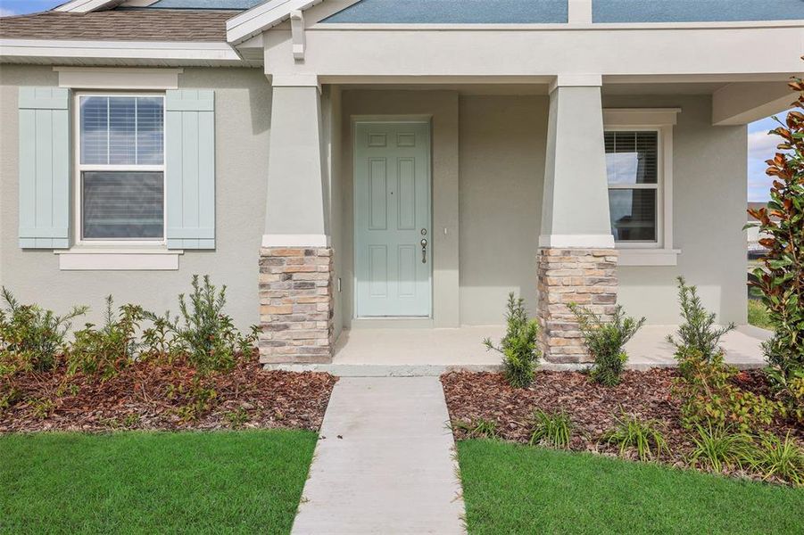 Exterior details and patio area of a home in Crossroads at Kelly Park, Apopka (Image 4).