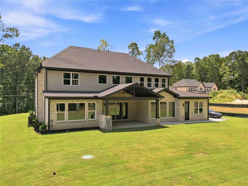 Exterior details and patio area of a home in , Loganville (Image 29).