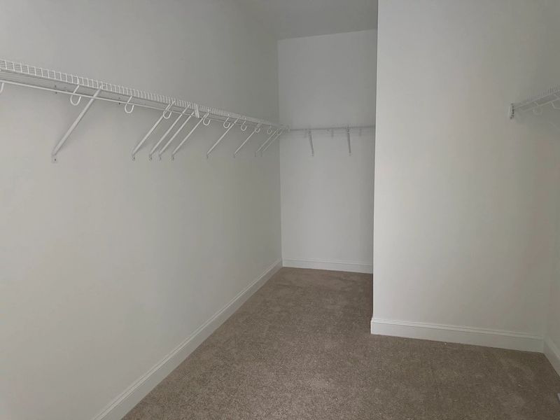 Primary Walk-In featuring the AW Collection® Coastal - Wire shelving adds clean, easy storage. Primary Walk-In featuring the AW Collection® Coastal - Wire shelving adds clean, easy storage.