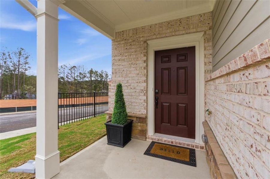 Exterior details and patio area of a home in Park Center Pointe, Mableton (Image 3).