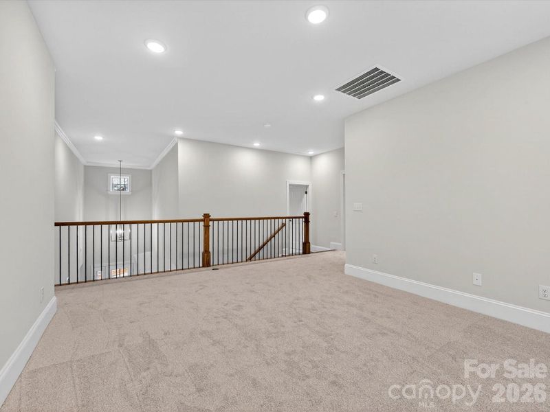Spacious, unfurnished interior of a new home in North Creek Village, Huntersville (Image 27).