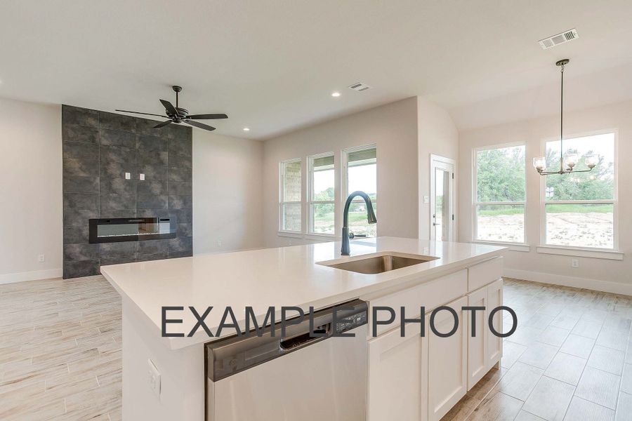 Representative furnished interior of a home built from the The Iris by Kenmark Homes in Rocky Top Ranch, Reno (Image 12).