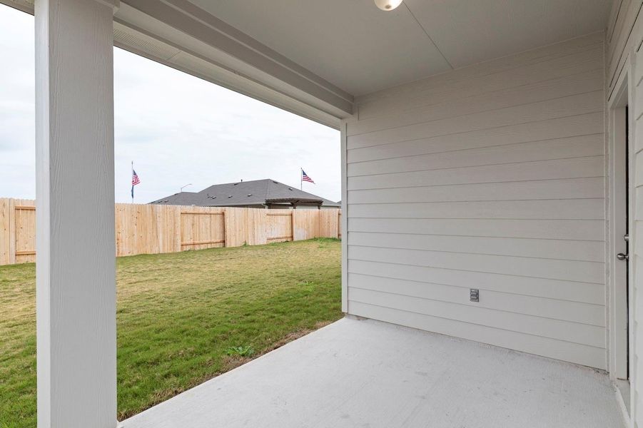 Fenced yard with a patio