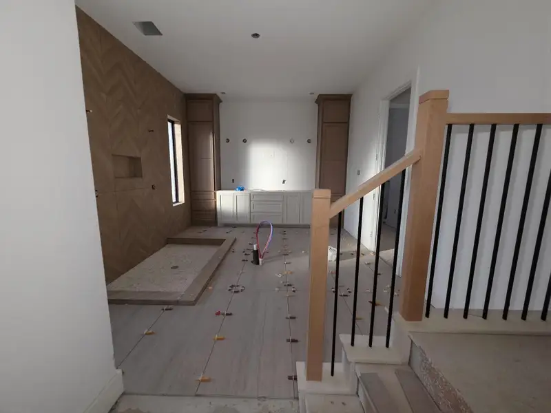 View of spa like bathroom from the closet. View of spa like bathroom from the closet.