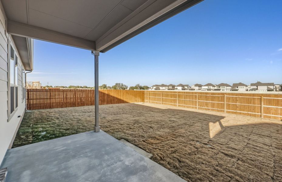 Exterior details and patio area of a home in Saddleback at Santa Rita Ranch, Liberty Hill (Image 30).