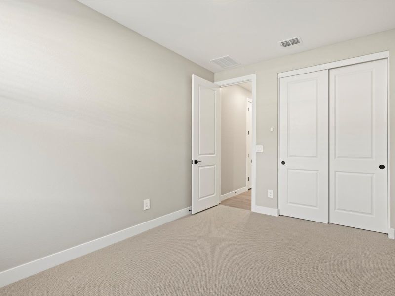 Spacious, unfurnished interior of a new home in White Tank Foothills Reserve Series, Waddell (Image 20).