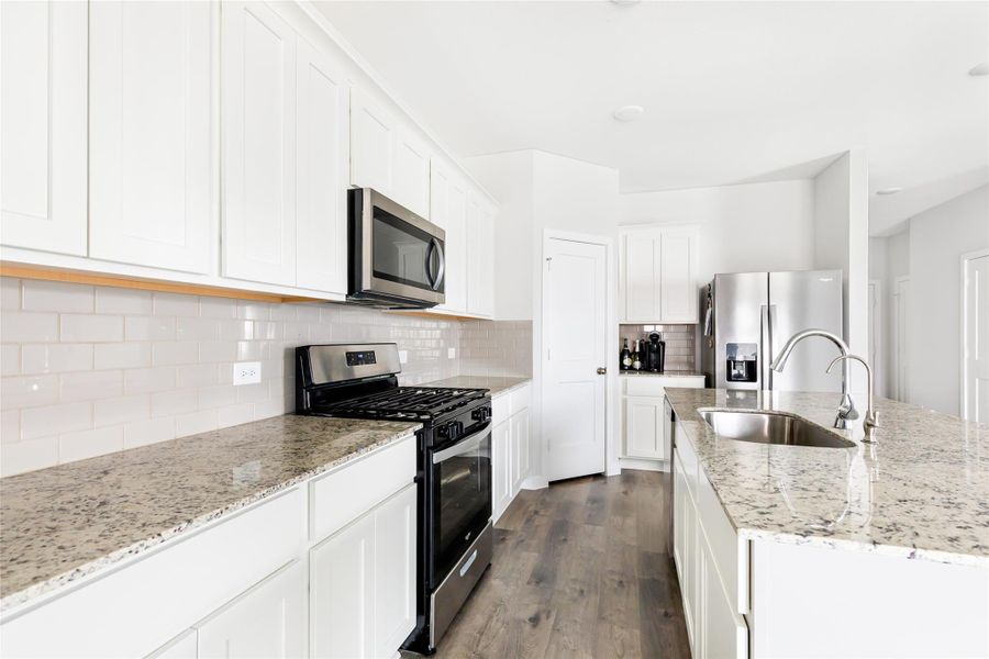 Furnished interior view inside a new home in Barrett Crossing, Crosby (Image 6).