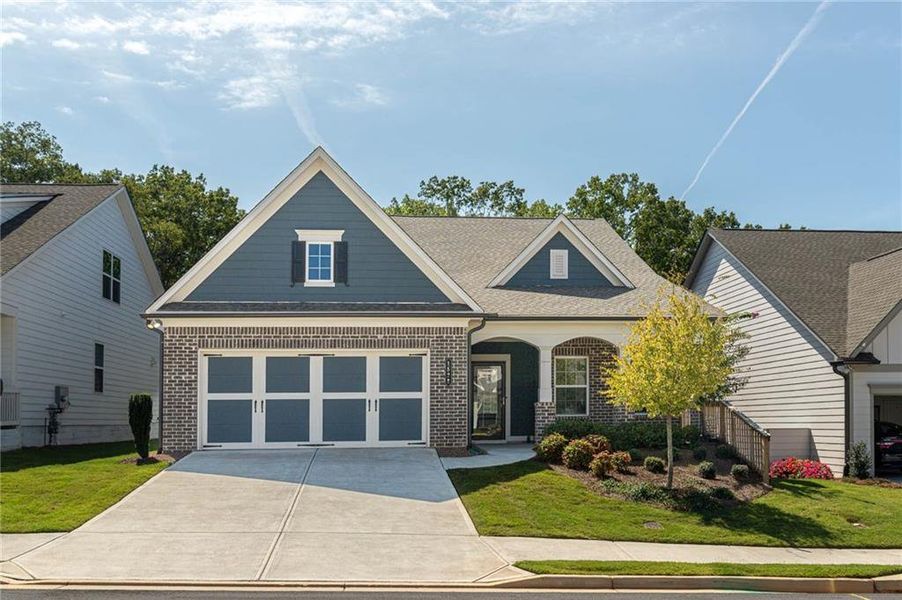 Front exterior of a new home in , Canton, GA, highlighting curb appeal (Image 24).