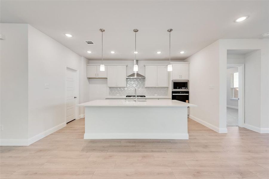 Furnished interior view inside a new home in Wildflower Ranch, Justin (Image 6).