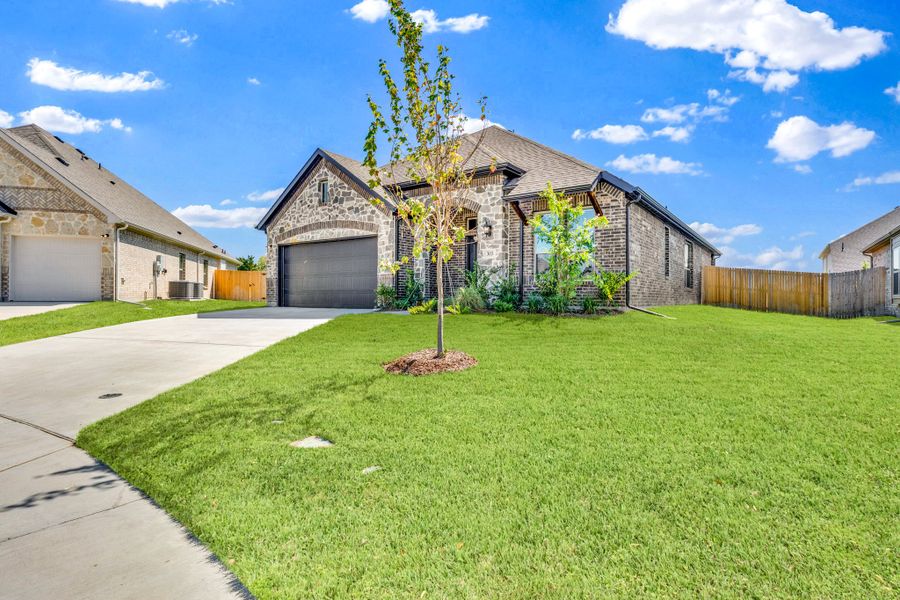 Front exterior of a new home in Summerwood, Red Oak, TX, highlighting curb appeal (Image 24).
