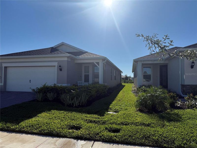 Exterior details and patio area of a home in Del Webb Sunbridge, St. Cloud (Image 2).