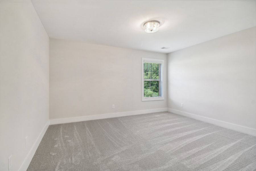 Representative unfurnished interior of a home built from the Sonoma II by Great Southern Homes in Edwards Ridge, Central (Image 37).