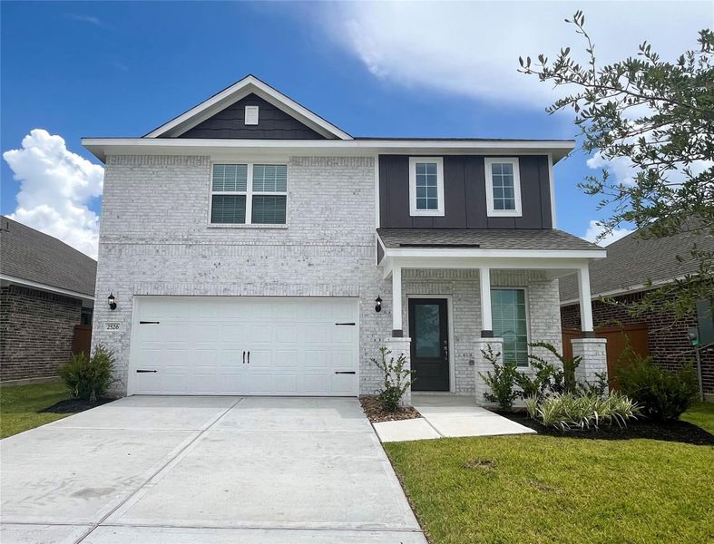 Front exterior of a new home in , Iowa Colony, TX, highlighting curb appeal (Image 1).