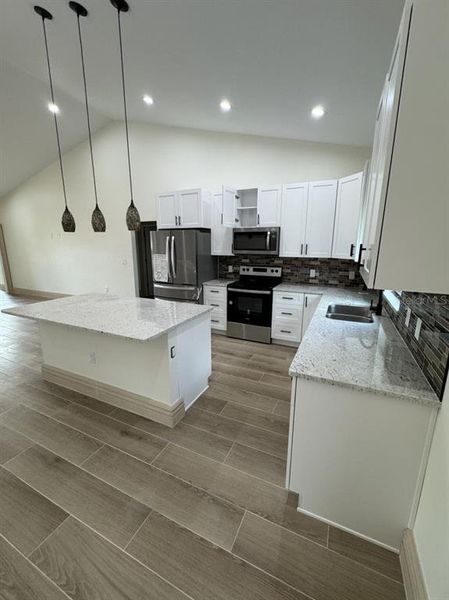 Furnished interior view inside a new home in , Okeechobee (Image 9).