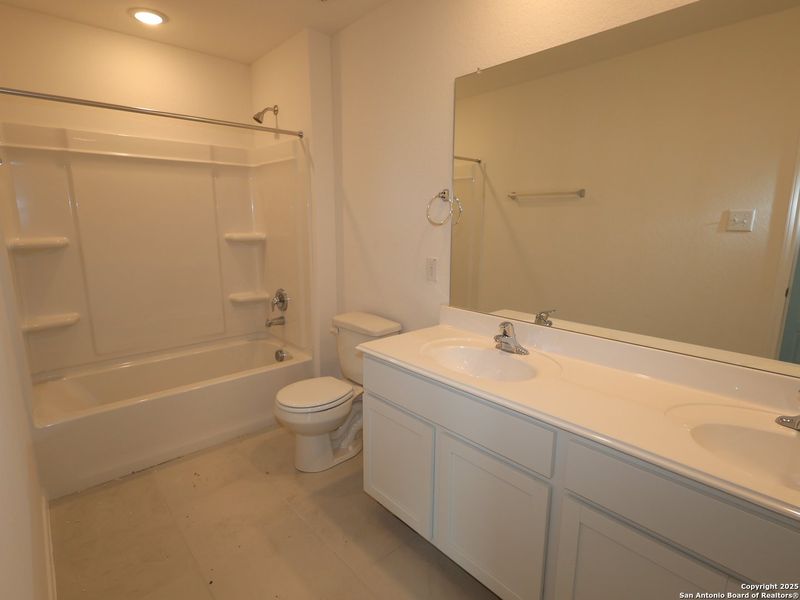 Furnished interior view inside a new home in Agave, San Antonio (Image 12).