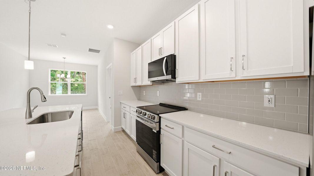 Furnished interior view inside a new home in , Palm Coast (Image 11).