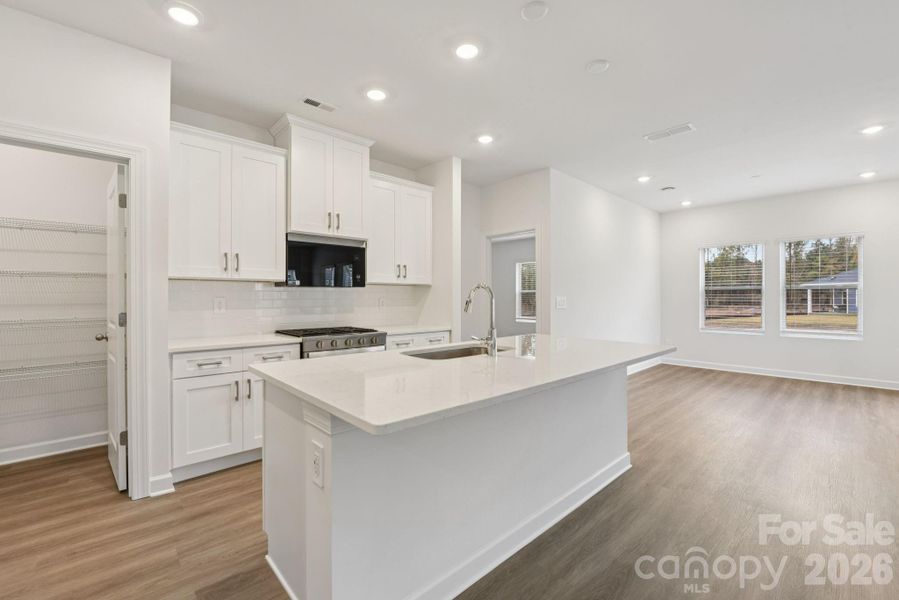 Photo is not of the actual home, but is an inspirational photo of builder’s model home and may depict options, furnishings, and/or decorator features that are not included