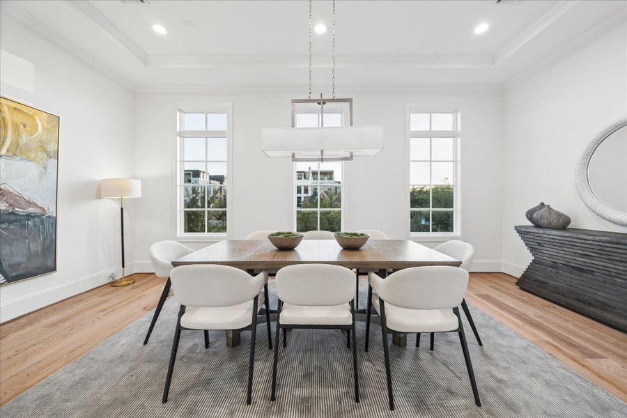 Oversized dining room with great windows and views towards the community.