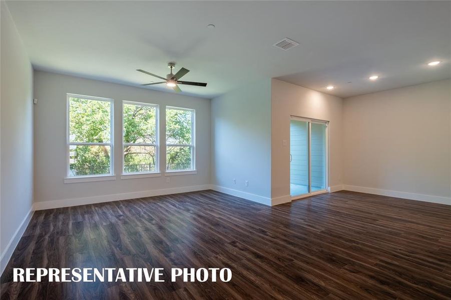 The entire family will love calling this spacious, light filled, open concept floor plan their home!  REPRESENTATIVE PHOTO