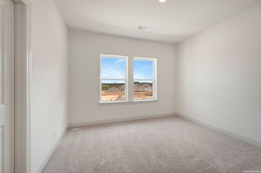 Spacious, unfurnished interior of a new home in Windsong - Legacy Series, Boerne (Image 40).