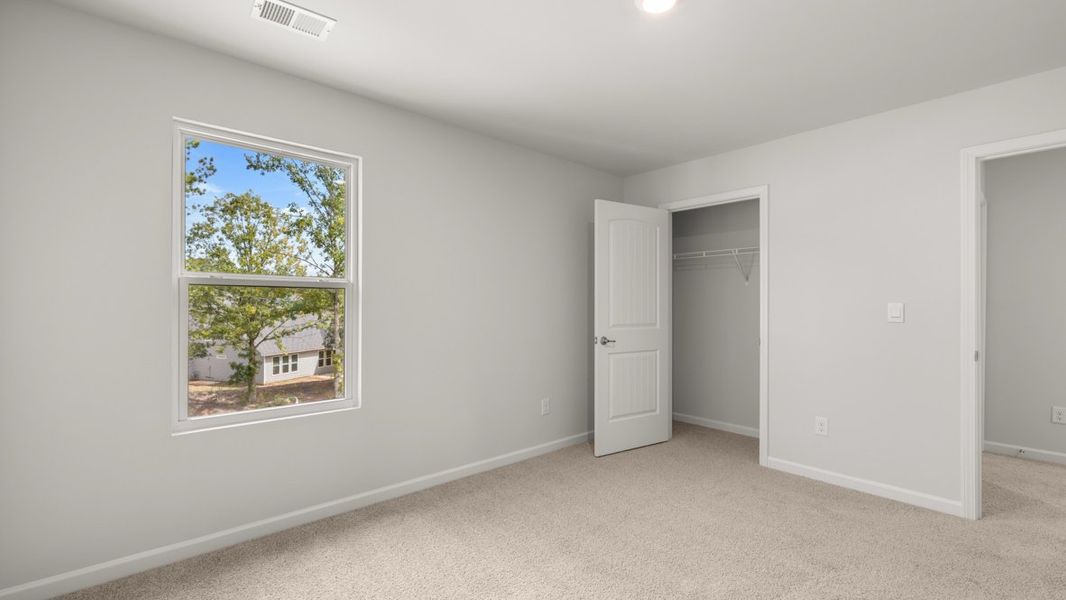 Representative unfurnished interior of a home built from the Elle by D.R. Horton in Fairway 17 at Mirror Lake, Villa Rica (Image 46). Representative unfurnished interior of a home built from the Elle by D.R. Horton in Fairway 17 at Mirror Lake, Villa Rica (Image 46).