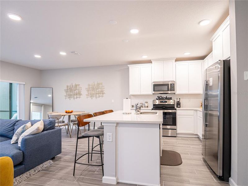 Furnished interior view inside a new home in Towns at Tuskawilla Commons, Oviedo (Image 27).
