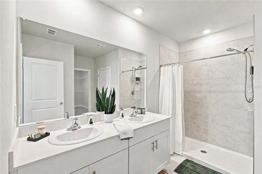 Furnished interior view inside a new home in Central Parc, North Port (Image 20). Furnished interior view inside a new home in Central Parc, North Port (Image 20).