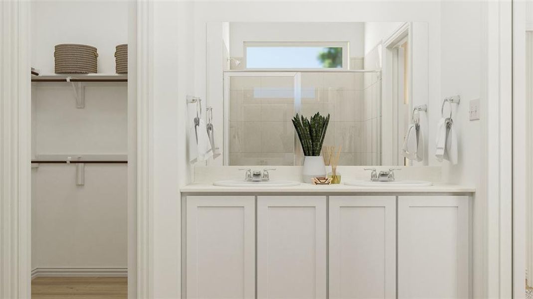 Bathroom with vanity, hardwood / wood-style floors, and a shower with shower door