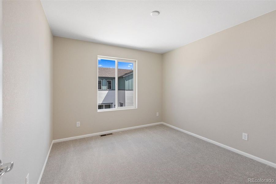 Spacious, unfurnished interior of a new home in Woodrose at Painted Prairie, Aurora (Image 34).