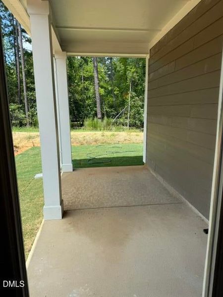 Exterior details and patio area of a home in The Walk at East Village, Clayton (Image 3).